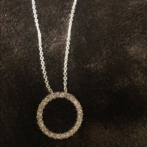 Silvertone necklace with round CZ’s.